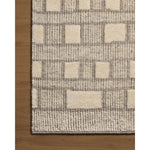 Featuring David Jean Stoffer x Loloi Grey Hand-Knotted Rug by Loloi at Amethyst Home. Unexpected stripes trace along the David Collection, a hand-knotted area rug with a plush, luxurious presence. Abstract patterns are carved into the design for a richly textured pile that's satisfying to sink into. This collection is made of 100% wool in India and Good. Amethyst Home provides interior design, new home construction design consulting, vintage area rugs, and lighting in the Newport Beach metro area.