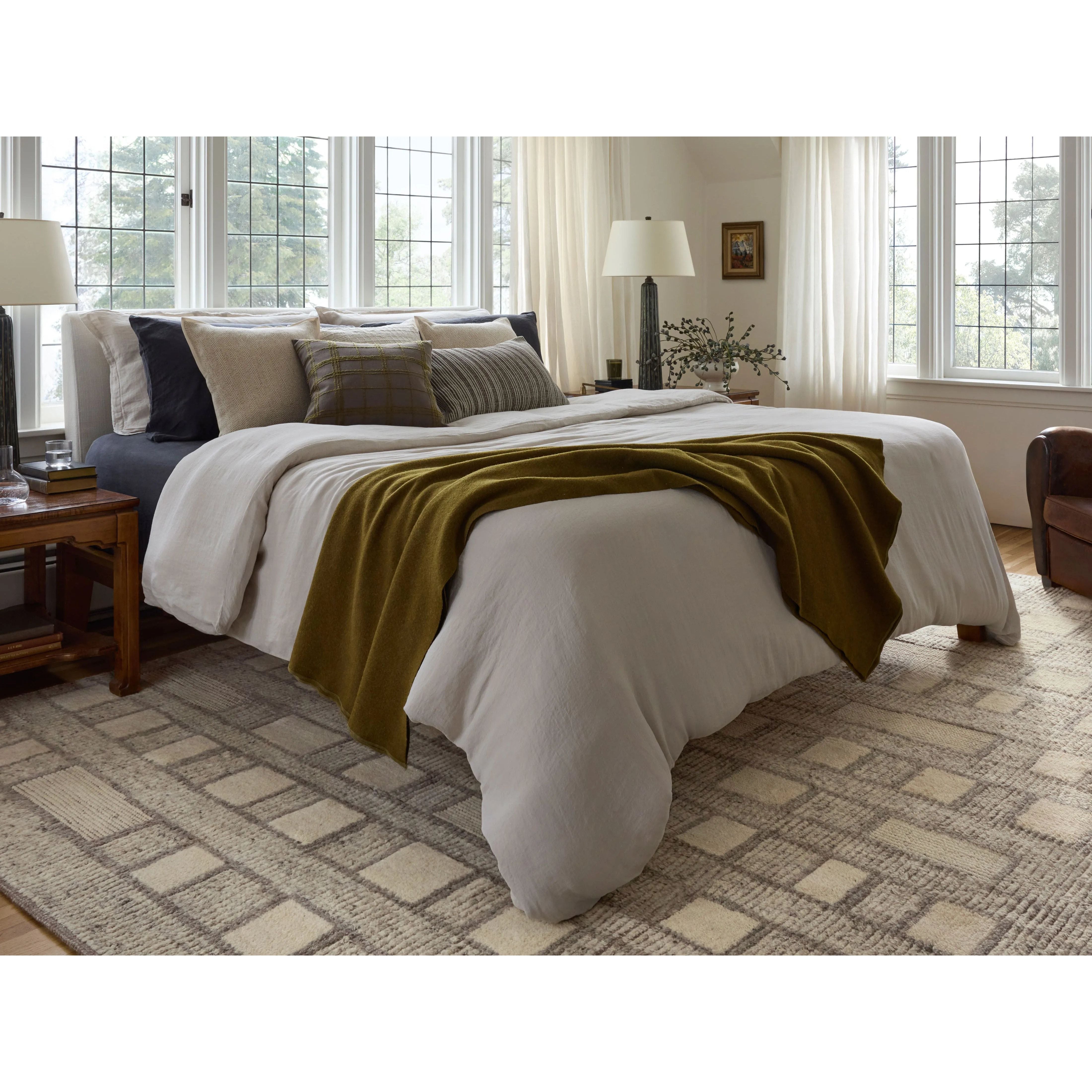 Featuring David Jean Stoffer x Loloi Grey Hand-Knotted Rug by Loloi at Amethyst Home. Unexpected stripes trace along the David Collection, a hand-knotted area rug with a plush, luxurious presence. Abstract patterns are carved into the design for a richly textured pile that's satisfying to sink into. This collection is made of 100% wool in India and GoodWeave. Amethyst Home provides interior design, new home construction design consulting, vintage area rugs, and lighting in the Portland metro area.