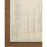 Featuring David Jean Stoffer x Loloi Ivory Hand-Knotted Rug by Loloi at Amethyst Home. Unexpected stripes trace along the David Collection, a hand-knotted area rug with a plush, luxurious presence. Abstract patterns are carved into the design for a richly textured pile that's satisfying to sink into. This collection is made of 100% wool in India and GoodWea. Amethyst Home provides interior design, new home construction design consulting, vintage area rugs, and lighting in the San Diego metro area.