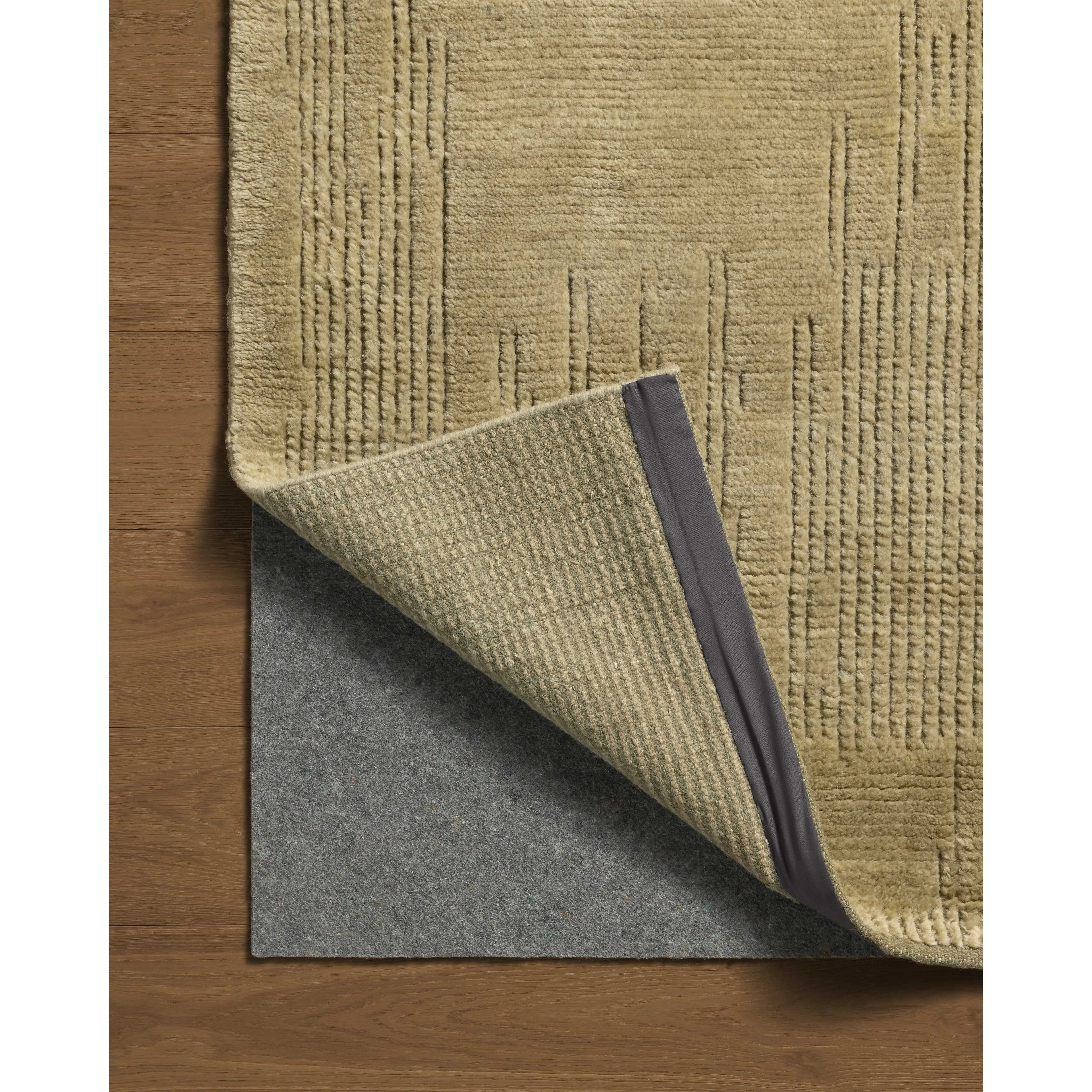 Featuring David Jean Stoffer x Loloi Olive Hand-Knotted Rug by Loloi at Amethyst Home. Unexpected stripes trace along the David Collection, a hand-knotted area rug with a plush, luxurious presence. Abstract patterns are carved into the design for a richly textured pile that's satisfying to sink into. This collection is made of 100% wool in India and GoodWe. Amethyst Home provides interior design, new home construction design consulting, vintage area rugs, and lighting in the Des Moines metro area.
