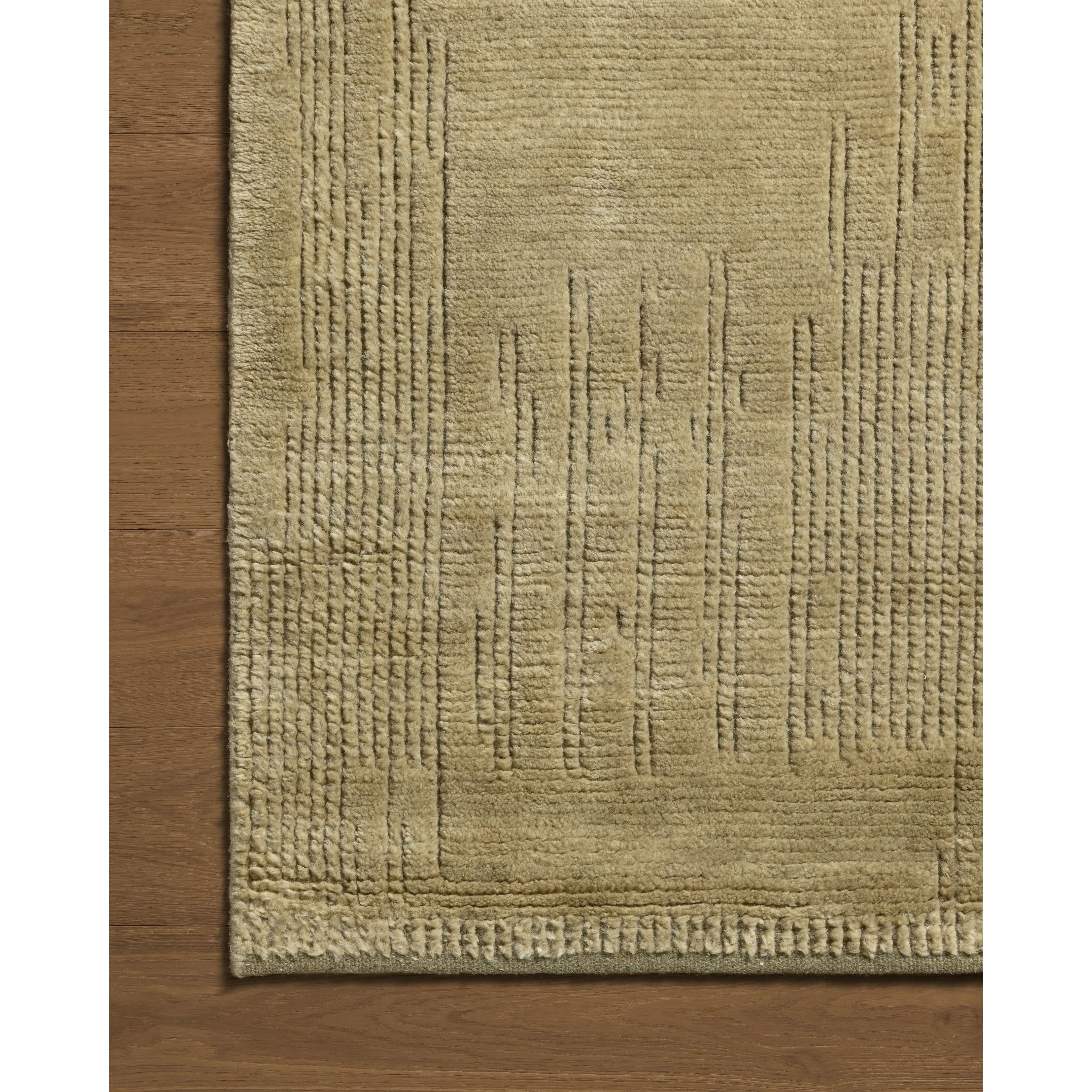 Featuring David Jean Stoffer x Loloi Olive Hand-Knotted Rug by Loloi at Amethyst Home. Unexpected stripes trace along the David Collection, a hand-knotted area rug with a plush, luxurious presence. Abstract patterns are carved into the design for a richly textured pile that's satisfying to sink into. This collection is made of 100% wool in India and GoodWeav. Amethyst Home provides interior design, new home construction design consulting, vintage area rugs, and lighting in the Monterey metro area.