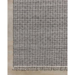 The Duncan Collection is a handmade area rug thats interwoven with white threads for subtle contrast and finished with fringed edges. This collection is soft yet exceptionally durable and easy to clean, making it right at home in busy living rooms, entryways, dining rooms, and outdoor patios. Amethyst Home provides interior design, new home construction design consulting, vintage area rugs, and lighting in the Seattle metro area.