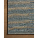 Featuring Elias Slate / Natural Rug by Loloi at Amethyst Home. The Elias Slate / Natural Rug is a hand-tufted wool area rug with lively graphic patterns in earth and stone tones. There’s a unique texture to the rug made by over-tufting, in which a design is hand-tufted over a tufted base, creating a subtle high-low pile. This collection is made in India. Amethyst Home provides interior design, new home construction design consulting, vintage area rugs, and lighting in the Winter Garden metro area.