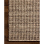 The Elma Collection is a vertically striped area rug framed with whip-stitched edges to help ground your space. This timeless, neutral rug is great for high-traffic living rooms, bedrooms, and dining rooms of many home decor styles. Amethyst Home provides interior design, new home construction design consulting, vintage area rugs, and lighting in the Laguna Beach metro area.
