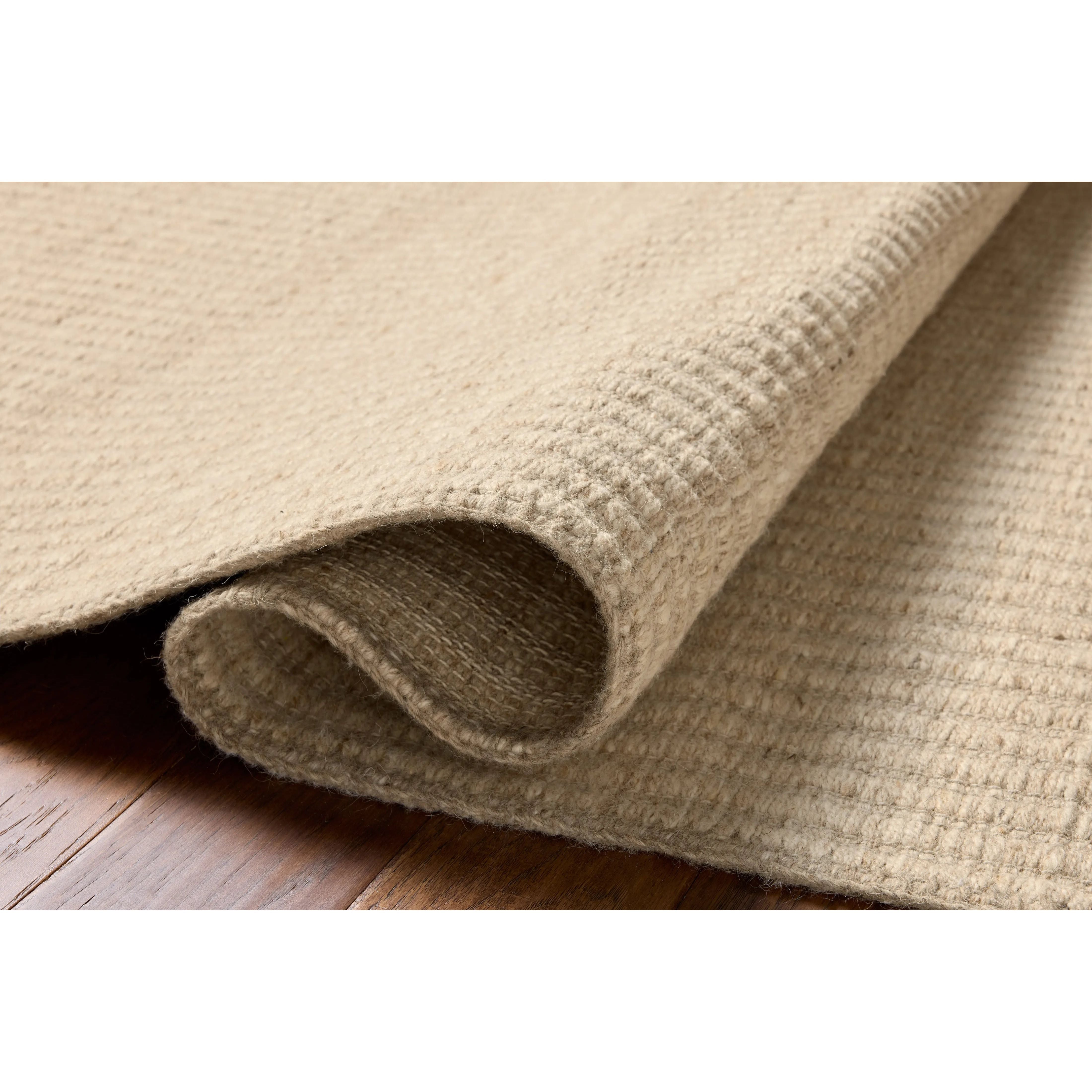 The Elma Collection is a vertically striped area rug framed with whip-stitched edges to help ground your space. This timeless, neutral rug is great for high-traffic living rooms, bedrooms, and dining rooms of many home decor styles. Amethyst Home provides interior design, new home construction design consulting, vintage area rugs, and lighting in the Nashville metro area.