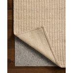 The Elma Collection is a vertically striped area rug framed with whip-stitched edges to help ground your space. This timeless, neutral rug is great for high-traffic living rooms, bedrooms, and dining rooms of many home decor styles. Amethyst Home provides interior design, new home construction design consulting, vintage area rugs, and lighting in the Nashville metro area.