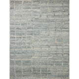 The Hughes Collection is a chunky and soft hand-knotted area rug with a graphic pattern for elevated home decor. The design comes to life with a space-dyed pile that reveals a multitude of beautiful tones, perfect for living rooms, bedrooms, and more high-traffic areas. Amethyst Home provides interior design, new home construction design consulting, vintage area rugs, and lighting in the Miami metro area.