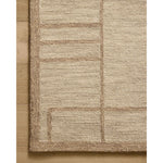 The Barrow Collection by Jeremiah Brent x Loloi is a hand-tufted area rug with a bold linear design inspired by modern art and classical architecture. The rugs pile is a blend of wool and jute for a stable, substantial feel that can ground living rooms, dining rooms, bedrooms, and more. Amethyst Home provides interior design, new home construction design consulting, vintage area rugs, and lighting in the Austin metro area.