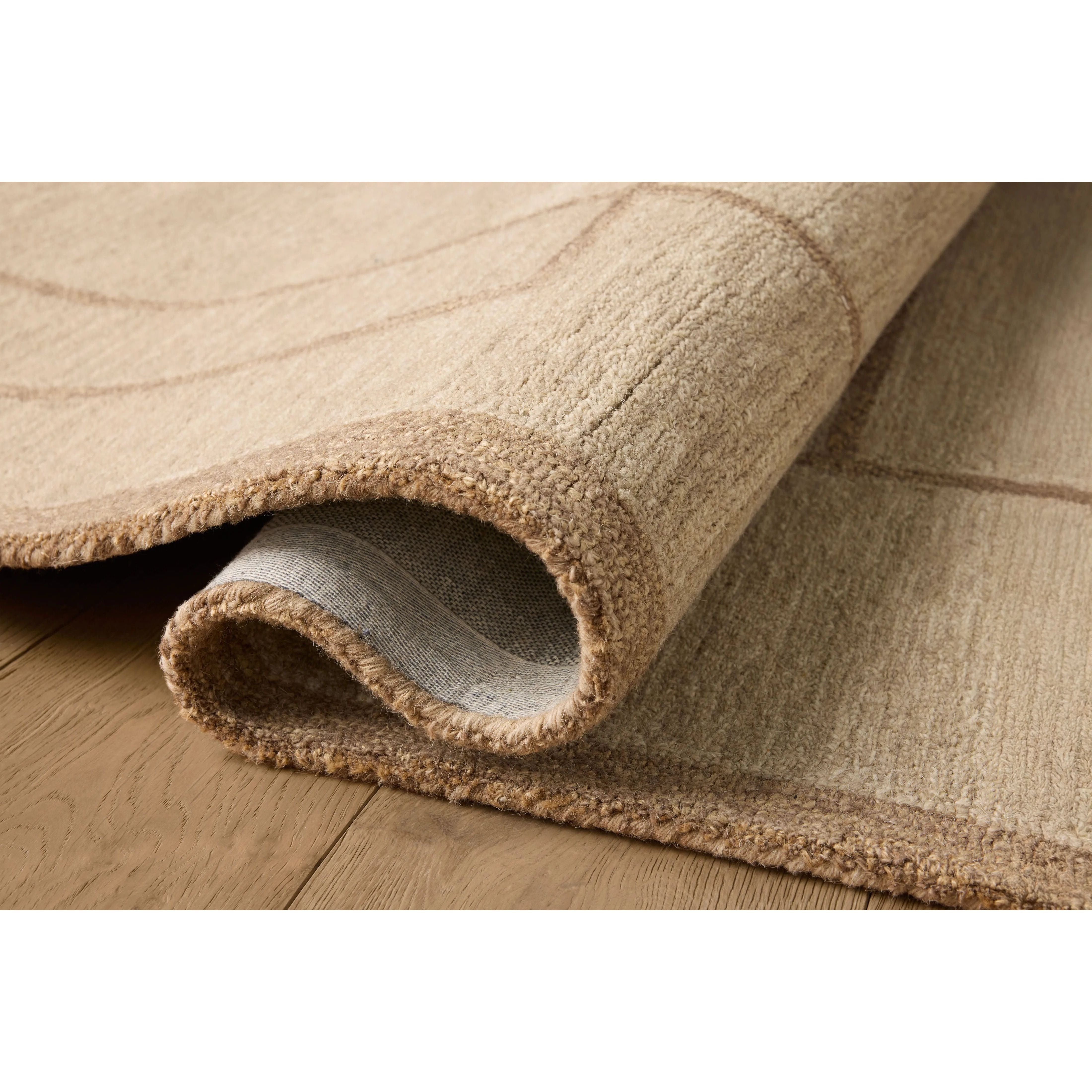 The Barrow Collection by Jeremiah Brent x Loloi is a hand-tufted area rug with a bold linear design inspired by modern art and classical architecture. The rugs pile is a blend of wool and jute for a stable, substantial feel that can ground living rooms, dining rooms, bedrooms, and more. Amethyst Home provides interior design, new home construction design consulting, vintage area rugs, and lighting in the Monterey metro area.