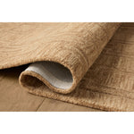 The Barrow Collection by Jeremiah Brent x Loloi is a hand-tufted area rug with a bold linear design inspired by modern art and classical architecture. The rug’s pile is a blend of wool and jute for a stable, substantial feel that can ground living rooms, dining rooms, bedrooms, and more. Amethyst Home provides interior design, new home construction design consulting, vintage area rugs, and lighting in the Dallas metro area.