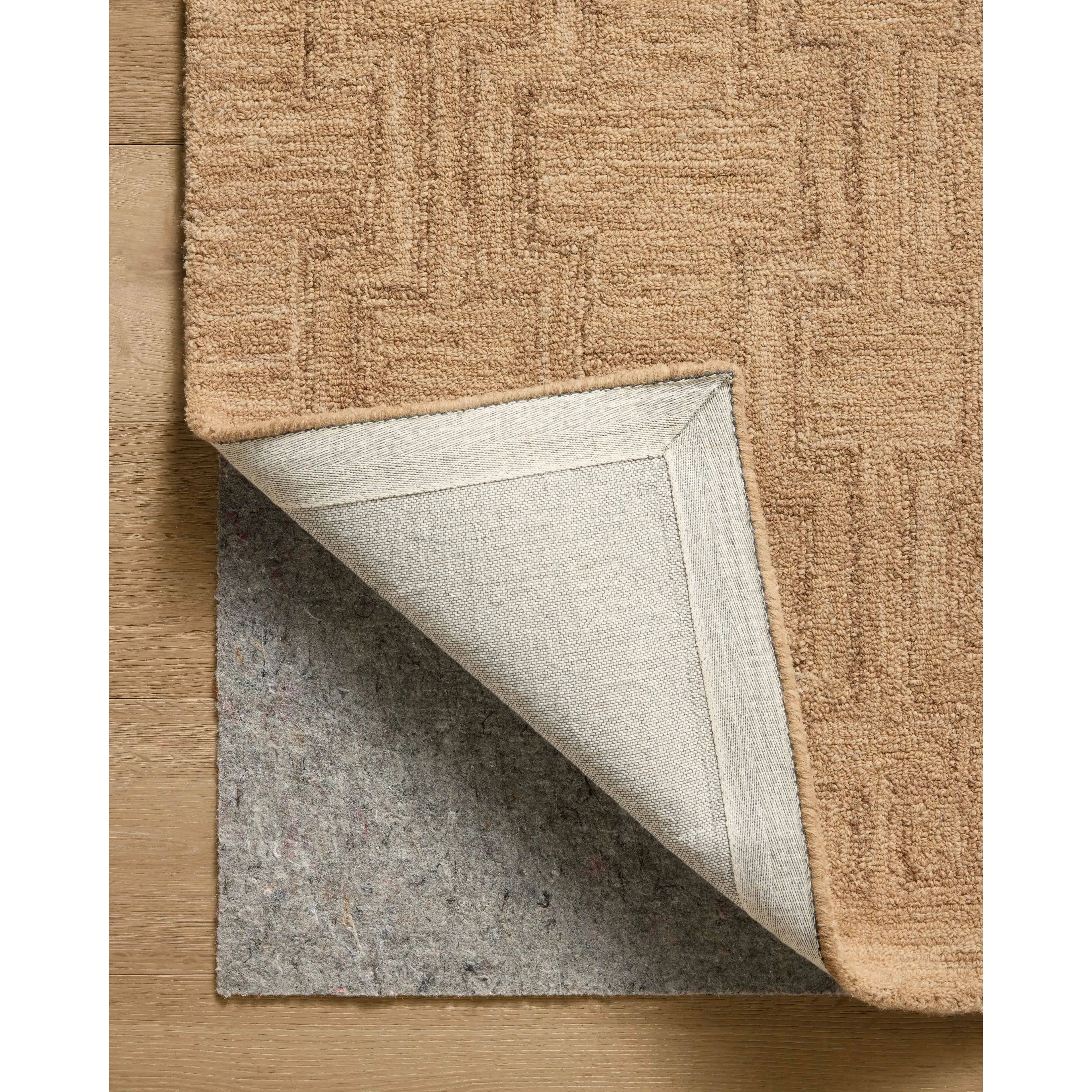 The Barrow Collection by Jeremiah Brent x Loloi is a hand-tufted area rug with a bold linear design inspired by modern art and classical architecture. The rug’s pile is a blend of wool and jute for a stable, substantial feel that can ground living rooms, dining rooms, bedrooms, and more. Amethyst Home provides interior design, new home construction design consulting, vintage area rugs, and lighting in the Des Moines metro area.