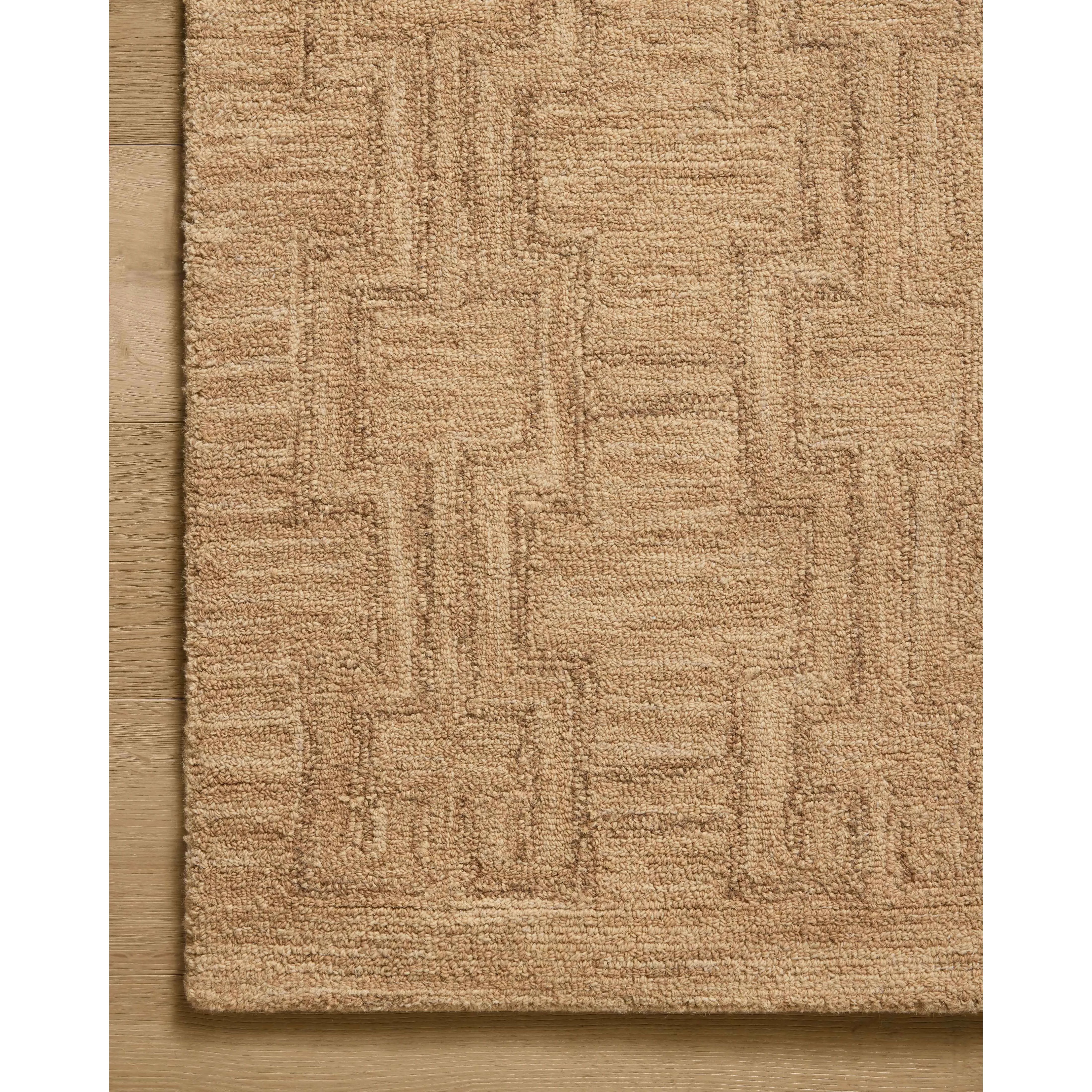 The Barrow Collection by Jeremiah Brent x Loloi is a hand-tufted area rug with a bold linear design inspired by modern art and classical architecture. The rug’s pile is a blend of wool and jute for a stable, substantial feel that can ground living rooms, dining rooms, bedrooms, and more. Amethyst Home provides interior design, new home construction design consulting, vintage area rugs, and lighting in the Omaha metro area.