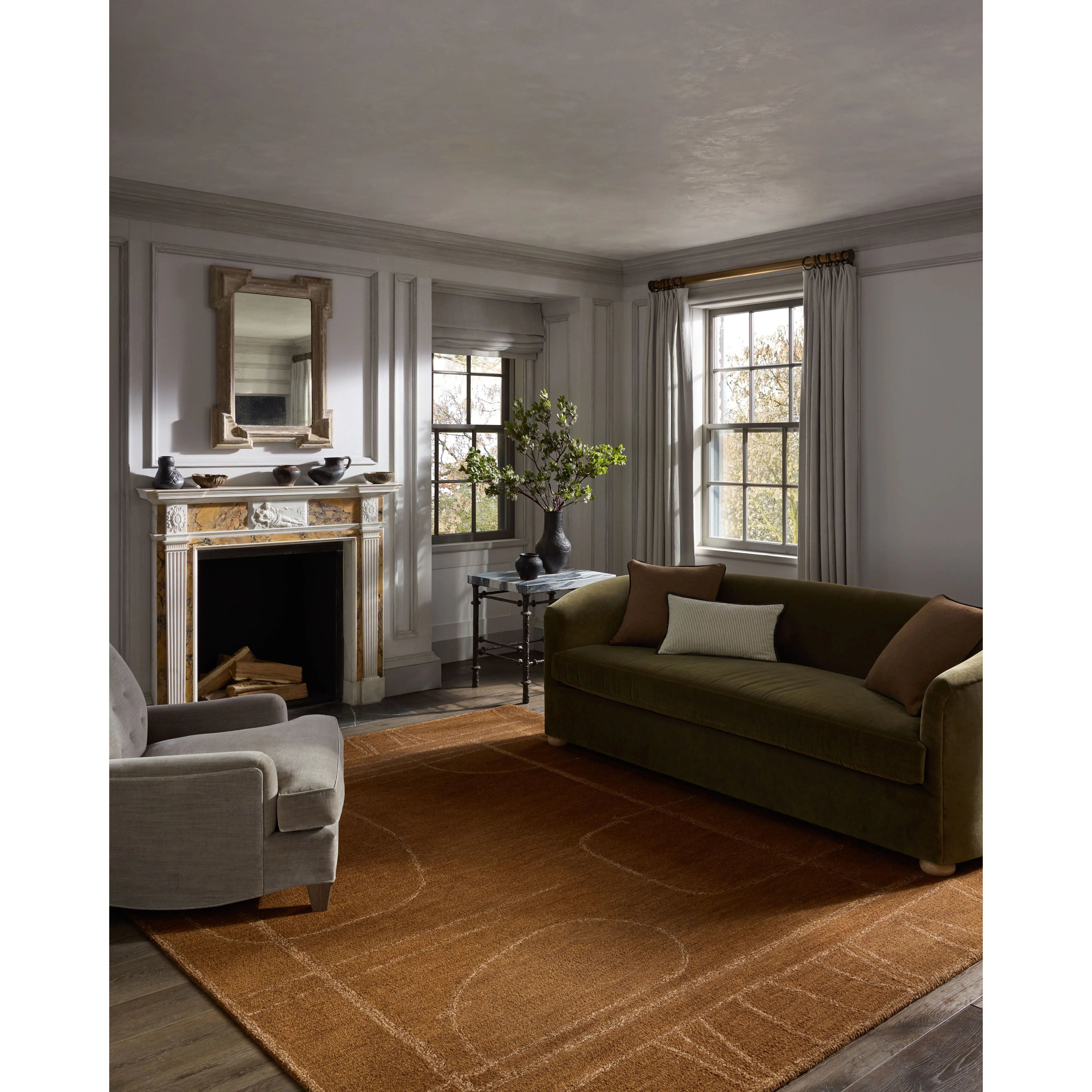 The Barrow Collection by Jeremiah Brent x Loloi is a hand-tufted area rug with a bold linear design inspired by modern art and classical architecture. The rug’s pile is a blend of wool and jute for a stable, substantial feel that can ground living rooms, dining rooms, bedrooms, and more. Amethyst Home provides interior design, new home construction design consulting, vintage area rugs, and lighting in the Washington metro area.