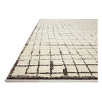 The Bleecker Collection by Jeremiah Brent x Loloi is a soft, power-loomed rug in warm colorways that change in different lighting. With high-contrast linear patterns and careful distressing, Bleecker represents Jeremiah love of modern design. Amethyst Home provides interior design, new home construction design consulting, vintage area rugs, and lighting in the Newport Beach metro area.
