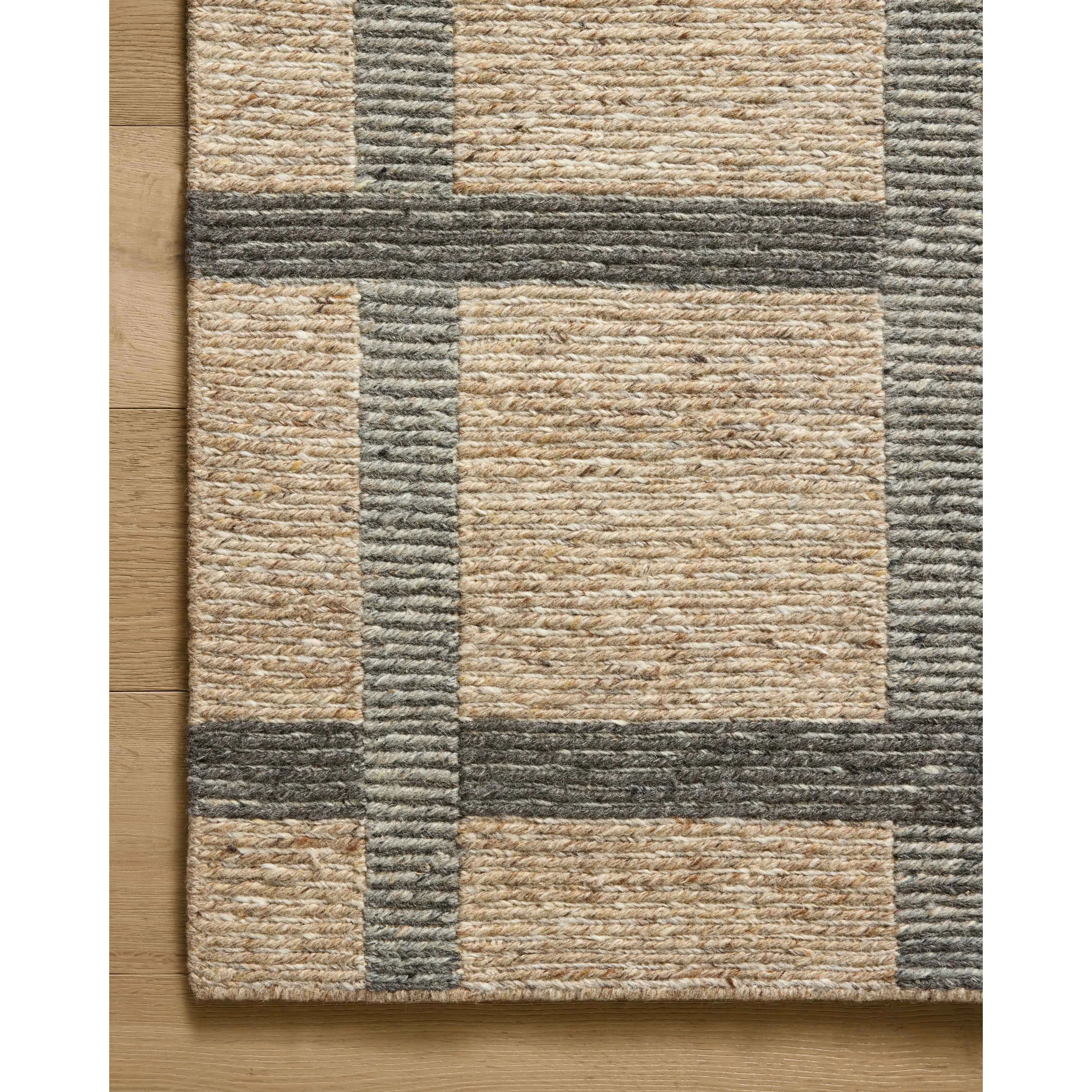 The Perry Collection by Jeremiah Brent x Loloi is a singular area rug made with a special soumak weave construction, a labor-intensive process that creates beautiful details and a sturdy, thick weave. Perry combines a traditional craft with a modern linear pattern in rich yet muted colors. Amethyst Home provides interior design, new home construction design consulting, vintage area rugs, and lighting in the Washington metro area.