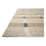 The Perry Collection by Jeremiah Brent x Loloi is a singular area rug made with a special soumak weave construction, a labor-intensive process that creates beautiful details and a sturdy, thick weave. Perry combines a traditional craft with a modern linear pattern in rich yet muted colors. Amethyst Home provides interior design, new home construction design consulting, vintage area rugs, and lighting in the Boston metro area.