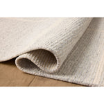 The Perry Collection by Jeremiah Brent x Loloi is a singular area rug made with a special soumak weave construction, a labor-intensive process that creates beautiful details and a sturdy, thick weave. Perry combines a traditional craft with a modern linear pattern in rich yet muted colors. Amethyst Home provides interior design, new home construction design consulting, vintage area rugs, and lighting in the Charlotte metro area.