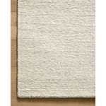 The Perry Collection by Jeremiah Brent x Loloi is a singular area rug made with a special soumak weave construction, a labor-intensive process that creates beautiful details and a sturdy, thick weave. Perry combines a traditional craft with a modern linear pattern in rich yet muted colors. Amethyst Home provides interior design, new home construction design consulting, vintage area rugs, and lighting in the Park City metro area.