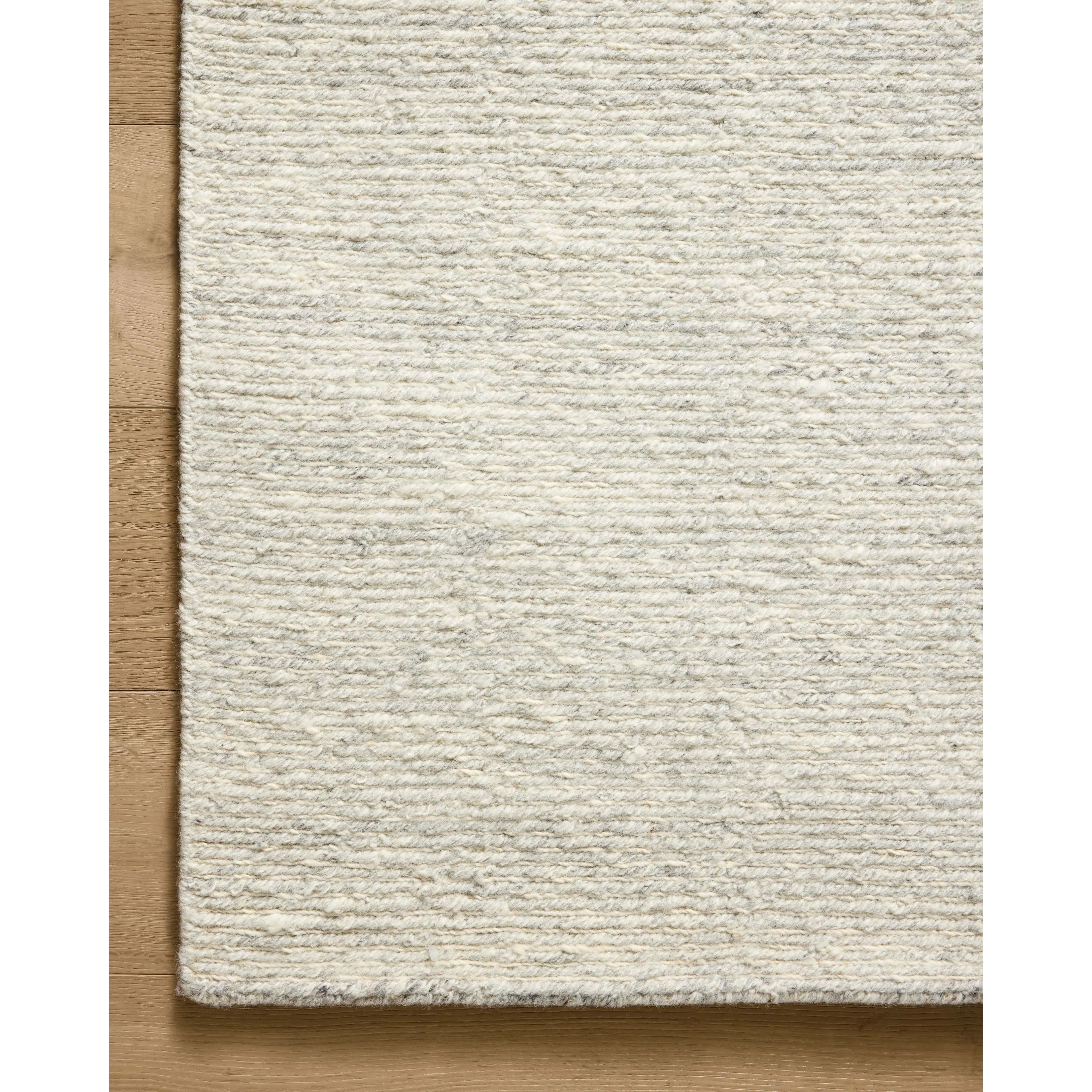 The Perry Collection by Jeremiah Brent x Loloi is a singular area rug made with a special soumak weave construction, a labor-intensive process that creates beautiful details and a sturdy, thick weave. Perry combines a traditional craft with a modern linear pattern in rich yet muted colors. Amethyst Home provides interior design, new home construction design consulting, vintage area rugs, and lighting in the Park City metro area.