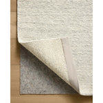 The Perry Collection by Jeremiah Brent x Loloi is a singular area rug made with a special soumak weave construction, a labor-intensive process that creates beautiful details and a sturdy, thick weave. Perry combines a traditional craft with a modern linear pattern in rich yet muted colors. Amethyst Home provides interior design, new home construction design consulting, vintage area rugs, and lighting in the Salt Lake City metro area.