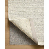 The Perry Collection by Jeremiah Brent x Loloi is a singular area rug made with a special soumak weave construction, a labor-intensive process that creates beautiful details and a sturdy, thick weave. Perry combines a traditional craft with a modern linear pattern in rich yet muted colors. Amethyst Home provides interior design, new home construction design consulting, vintage area rugs, and lighting in the Salt Lake City metro area.