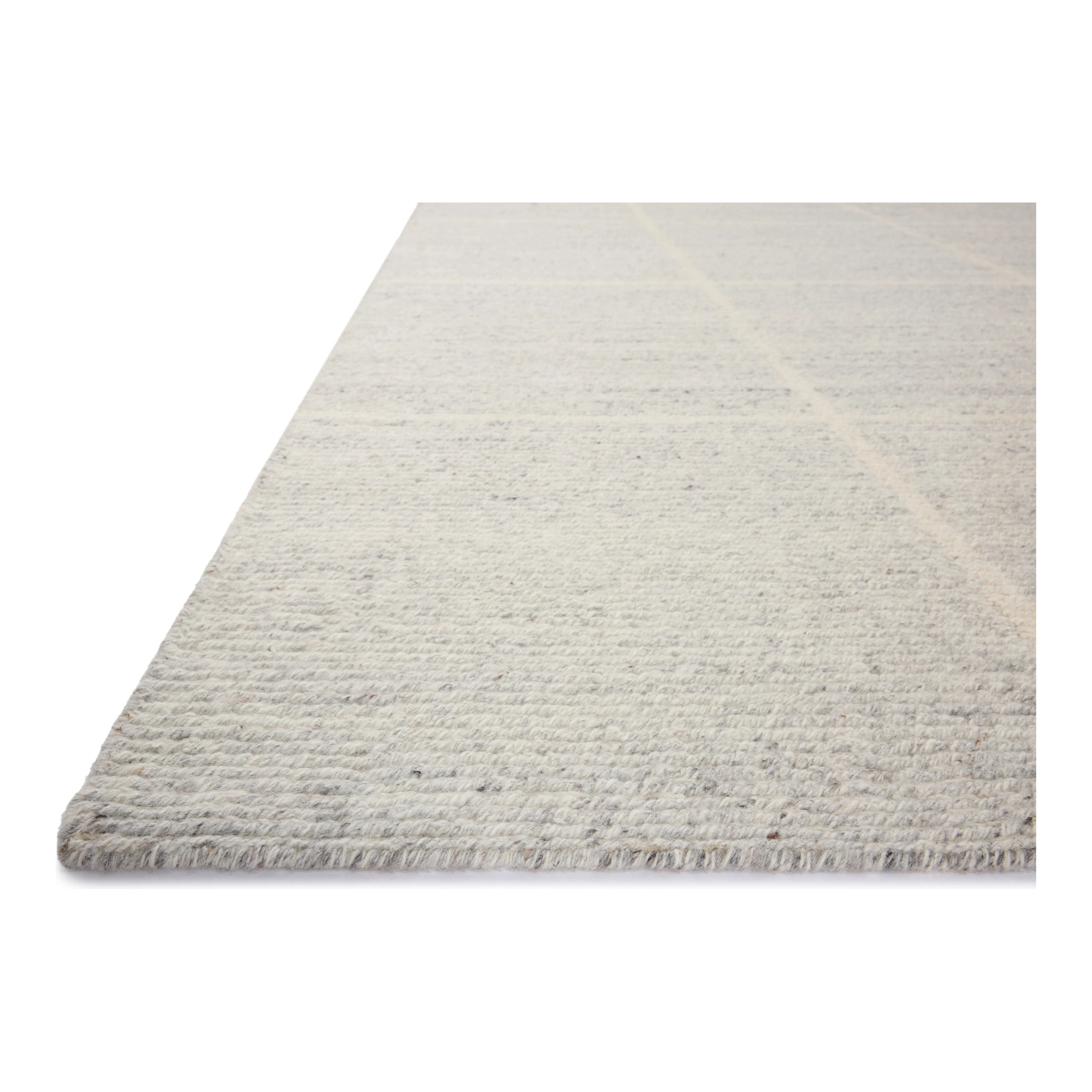 The Perry Collection by Jeremiah Brent x Loloi is a singular area rug made with a special soumak weave construction, a labor-intensive process that creates beautiful details and a sturdy, thick weave. Perry combines a traditional craft with a modern linear pattern in rich yet muted colors. Amethyst Home provides interior design, new home construction design consulting, vintage area rugs, and lighting in the San Diego metro area.