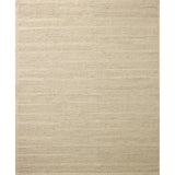 The Lennox Collection by Leanne Ford x Loloi is a statement area rug made with natural undyed wool that reveals subtle color differentiation in creamy neutral tones. The rug is hand-woven with a labor-intensive soumak weave, alternating rows of thick and thin looped yarns for an organic, inviting texture. Amethyst Home provides interior design, new home construction design consulting, vintage area rugs, and lighting in the Houston metro area.