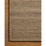 The Lennox Collection by Leanne Ford x Loloi is a statement area rug made with natural undyed wool that reveals subtle color differentiation in creamy neutral tones. The rug is hand-woven with a labor-intensive soumak weave, alternating rows of thick and thin looped yarns for an organic, inviting texture. Amethyst Home provides interior design, new home construction design consulting, vintage area rugs, and lighting in the Newport Beach metro area.