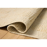 The Sowerby Collection is a wonderfully textural area rug by Leanne Ford x Loloi with a unique construction: alternating high-cut wool and jute pile on a nubby flatweave base to create an organic checkerboard pattern. Available in creamy neutrals and rich, earthy tones, Sowerby is a sophisticated neutral rug for living rooms, bedrooms, and more. Amethyst Home provides interior design, new home construction design consulting, vintage area rugs, and lighting in the Dallas metro area.