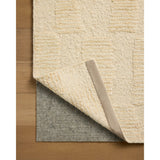 The Sowerby Collection is a wonderfully textural area rug by Leanne Ford x Loloi with a unique construction: alternating high-cut wool and jute pile on a nubby flatweave base to create an organic checkerboard pattern. Available in creamy neutrals and rich, earthy tones, Sowerby is a sophisticated neutral rug for living rooms, bedrooms, and more. Amethyst Home provides interior design, new home construction design consulting, vintage area rugs, and lighting in the Nashville metro area.