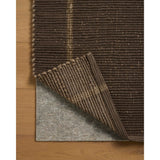 The Weatherstaff Collection is a vertically striped jute area rug with an organic look and feel, designed by Leanne Ford x Loloi. The earth-toned area rug features flatwoven jute that creates a ribbed texture horizontally, with stripes that are vertical—a playful combination. Amethyst Home provides interior design, new home construction design consulting, vintage area rugs, and lighting in the Tampa metro area.