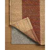 The Weatherstaff Collection is a vertically striped jute area rug with an organic look and feel, designed by Leanne Ford x Loloi. The earth-toned area rug features flatwoven jute that creates a ribbed texture horizontally, with stripes that are vertical—a playful combination. Amethyst Home provides interior design, new home construction design consulting, vintage area rugs, and lighting in the Portland metro area.