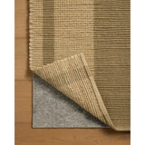 The Weatherstaff Collection is a vertically striped jute area rug with an organic look and feel, designed by Leanne Ford x Loloi. The earth-toned area rug features flatwoven jute that creates a ribbed texture horizontally, with stripes that are vertical—a playful combination. Amethyst Home provides interior design, new home construction design consulting, vintage area rugs, and lighting in the Portland metro area.