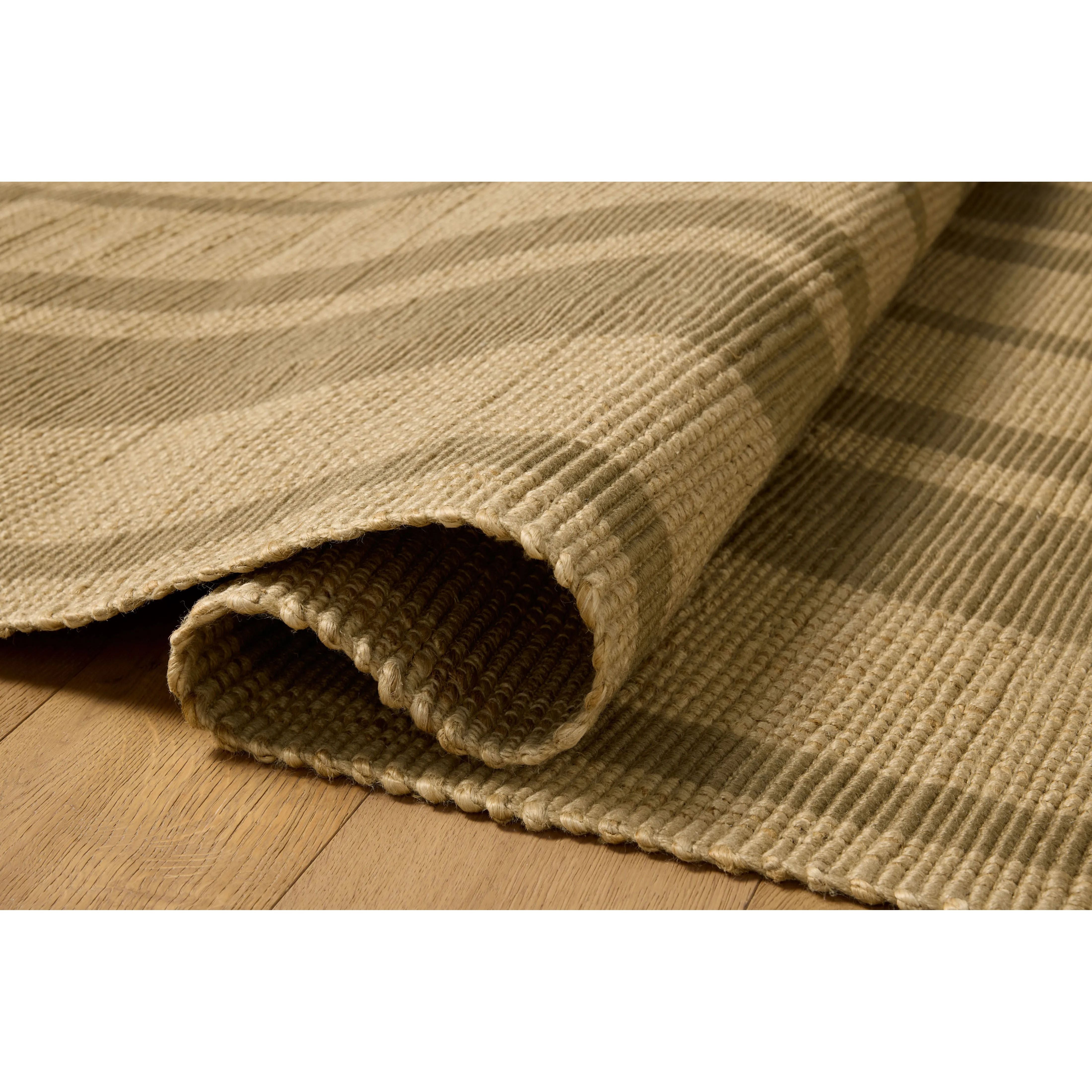 The Weatherstaff Collection is a vertically striped jute area rug with an organic look and feel, designed by Leanne Ford x Loloi. The earth-toned area rug features flatwoven jute that creates a ribbed texture horizontally, with stripes that are vertical—a playful combination. Amethyst Home provides interior design, new home construction design consulting, vintage area rugs, and lighting in the Winter Garden metro area.