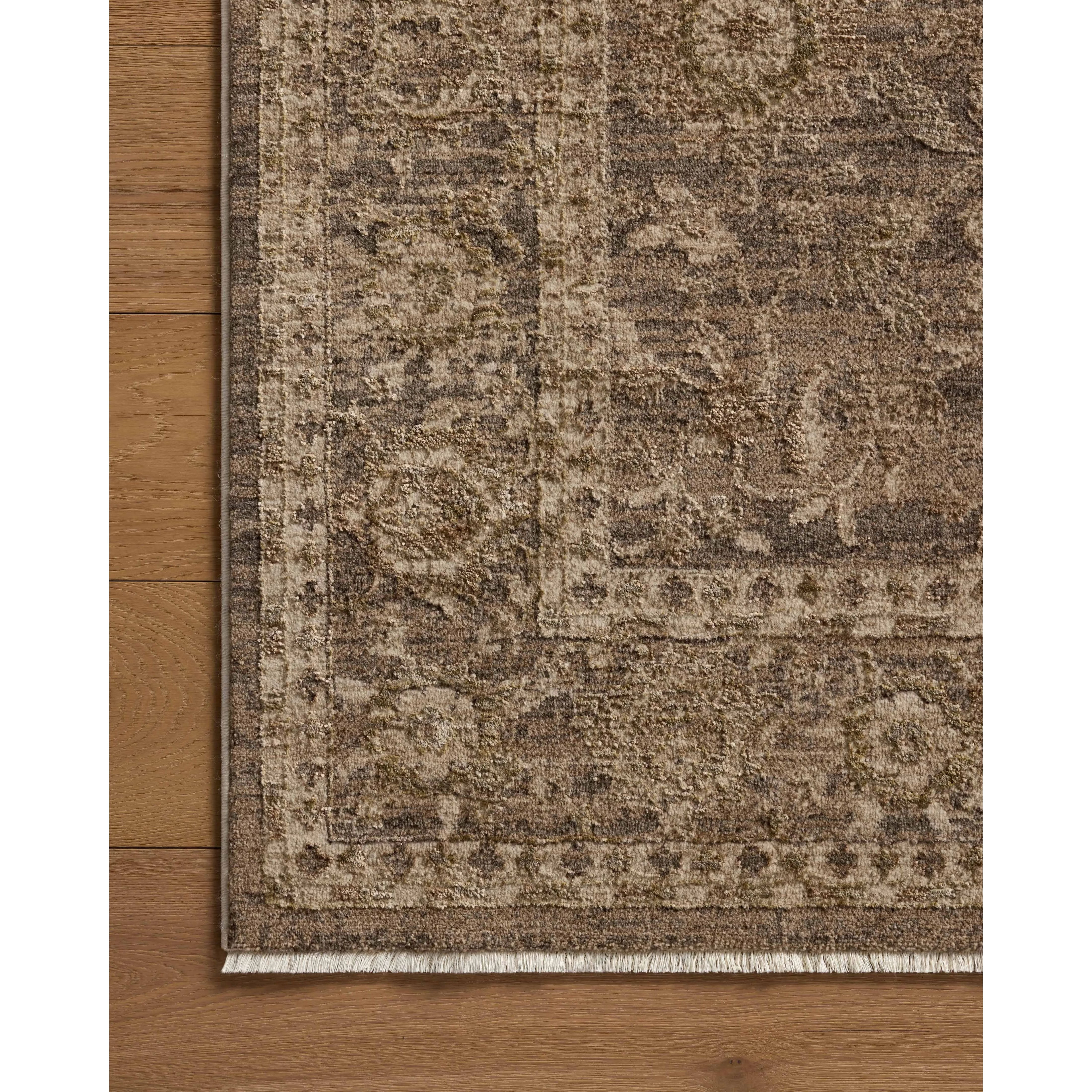 The Haywood Collection is an easy-to-clean, earth-toned area rug with a subtly distressed traditional design. Haywood is power-loomed of polyester in Turkey, a durable area rug for a living room, bedroom, dining room, or other high-traffic spaces. Amethyst Home provides interior design, new home construction design consulting, vintage area rugs, and lighting in the Miami metro area.