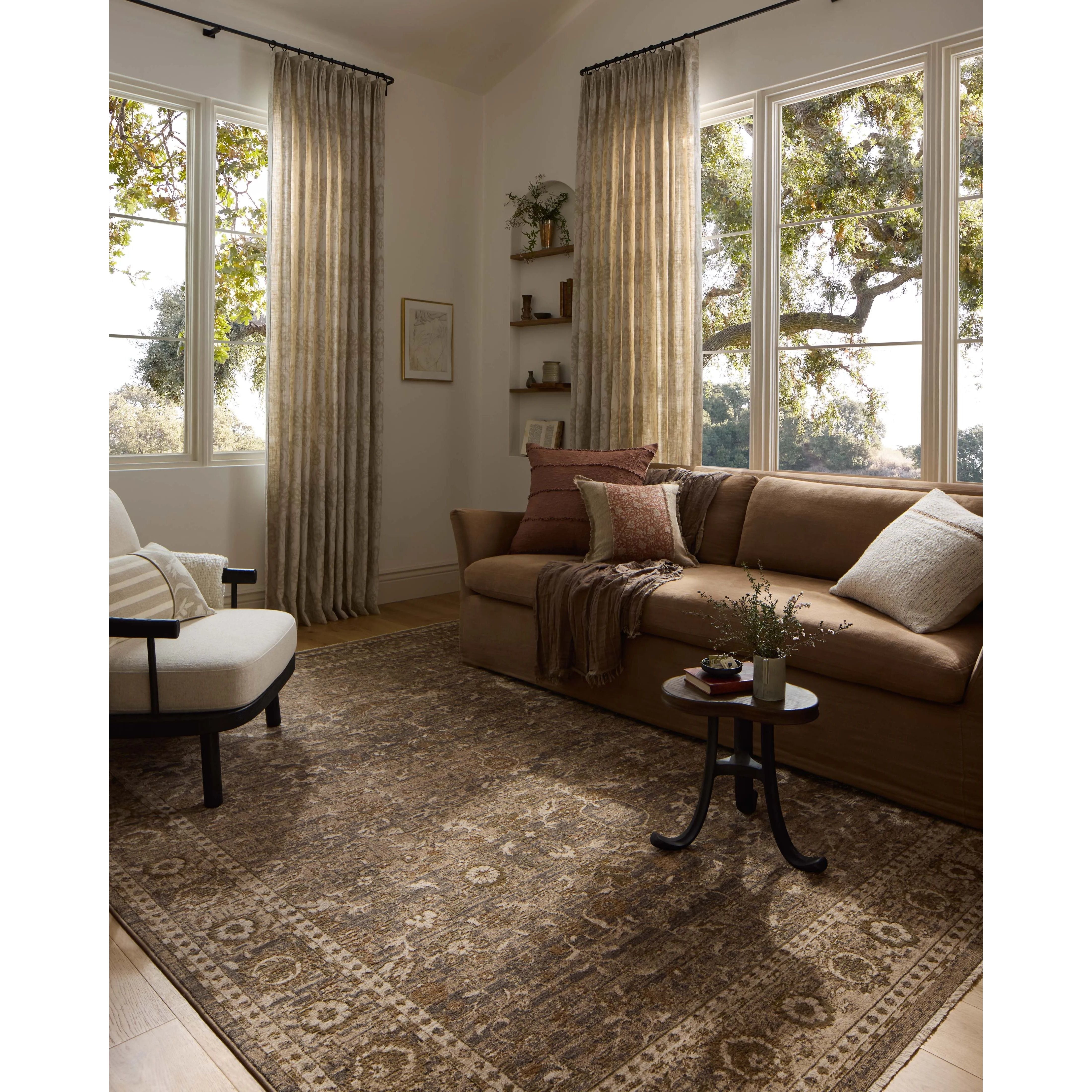 Featuring Haywood Charcoal Rug by Loloi at Amethyst Home. The Haywood Collection is an easy-to-clean, earth-toned area rug with a subtly distressed traditional design. Haywood is power-loomed of polyester in Turkey, a durable area rug for a living room, bedroom, dining room, or other high-traffic spaces.  Power Loomed  HYD-02 Loloi Ii x Loloi Charcoal. Amethyst Home provides interior design, new home construction design consulting, vintage area rugs, and lighting in the Omaha metro area.