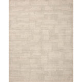 The Maren Collection is a unique handmade area rug made with a new technique that creates a dotted texture, almost like fine embroidery, but with a substantial hand-loomed feel. The pile reveals modern geometric patterns with organic shapes and natural softness, available in light, easygoing neutrals. Amethyst Home provides interior design, new home construction design consulting, vintage area rugs, and lighting in the Kansas City metro area.