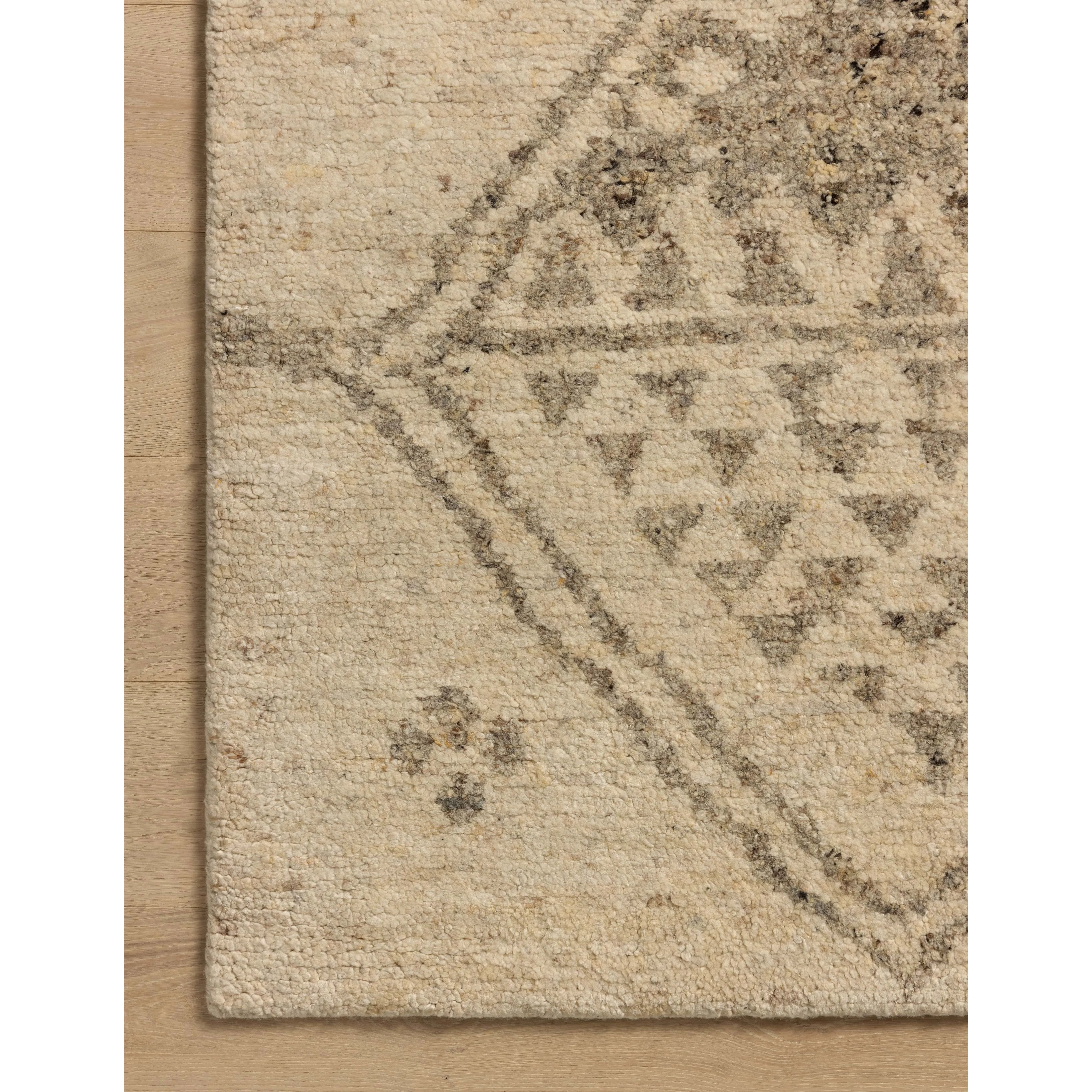 Featuring Meryl Ivory / Grey Hand-Knotted Rug by Loloi at Amethyst Home. The Meryl Collection is a hand-knotted area rug that reimagines traditional Moroccan motifs at a much larger scale for a striking, modern feel. With an especially plush and chunky pile, its the ideal bedroom rug (and very welcome in living rooms, too). This collection is hand-knotte. Amethyst Home provides interior design, new home construction design consulting, vintage area rugs, and lighting in the Laguna Beach metro area.