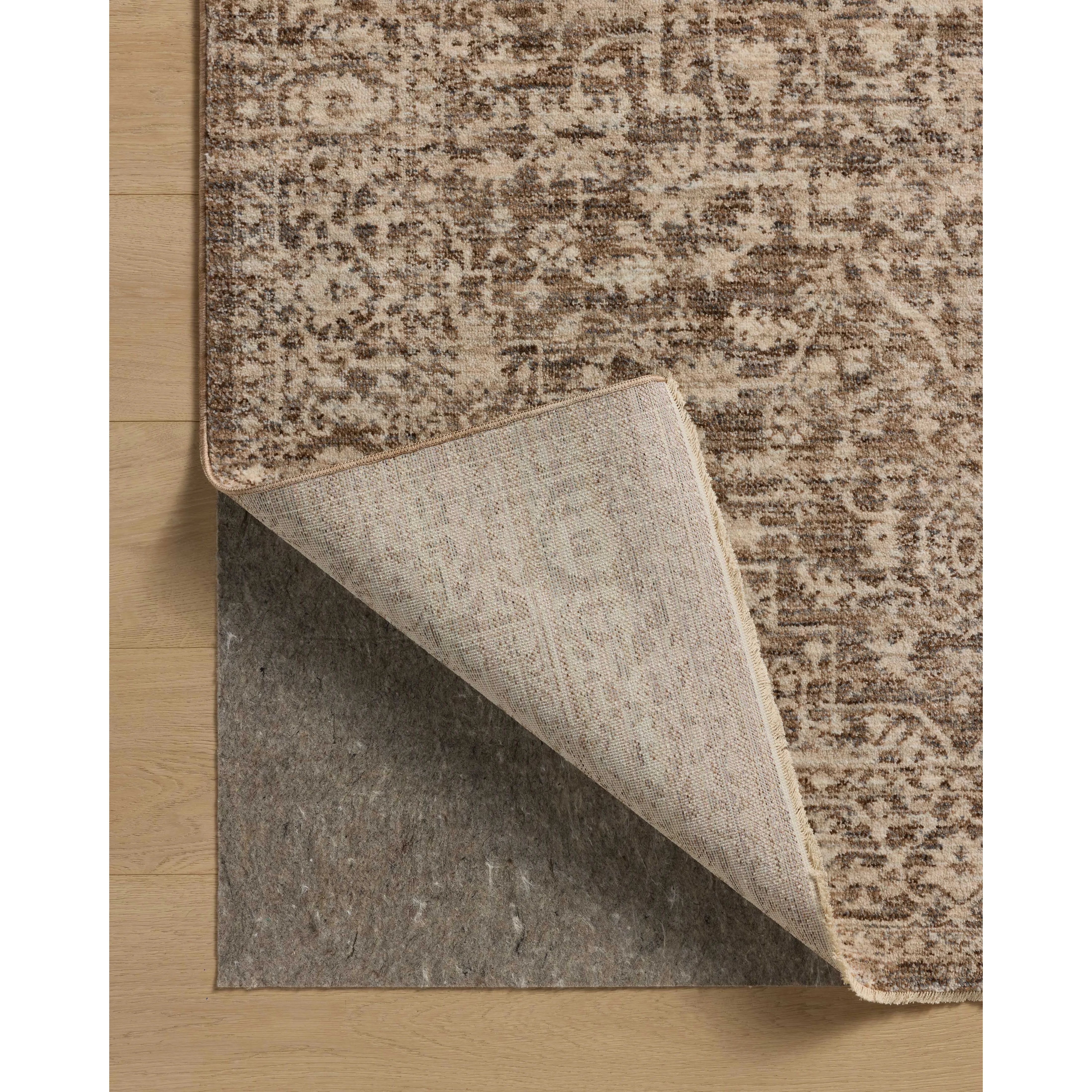 The Newman Collection is a power-loomed area rug made of soft space-dyed polyester, which lends a subtle gradation of color in an easy-to-clean, no-shed construction. The versatile, vintage-inspired design features distressed white motifs against lovely and light tonal backgrounds. Amethyst Home provides interior design, new home construction design consulting, vintage area rugs, and lighting in the San Diego metro area.