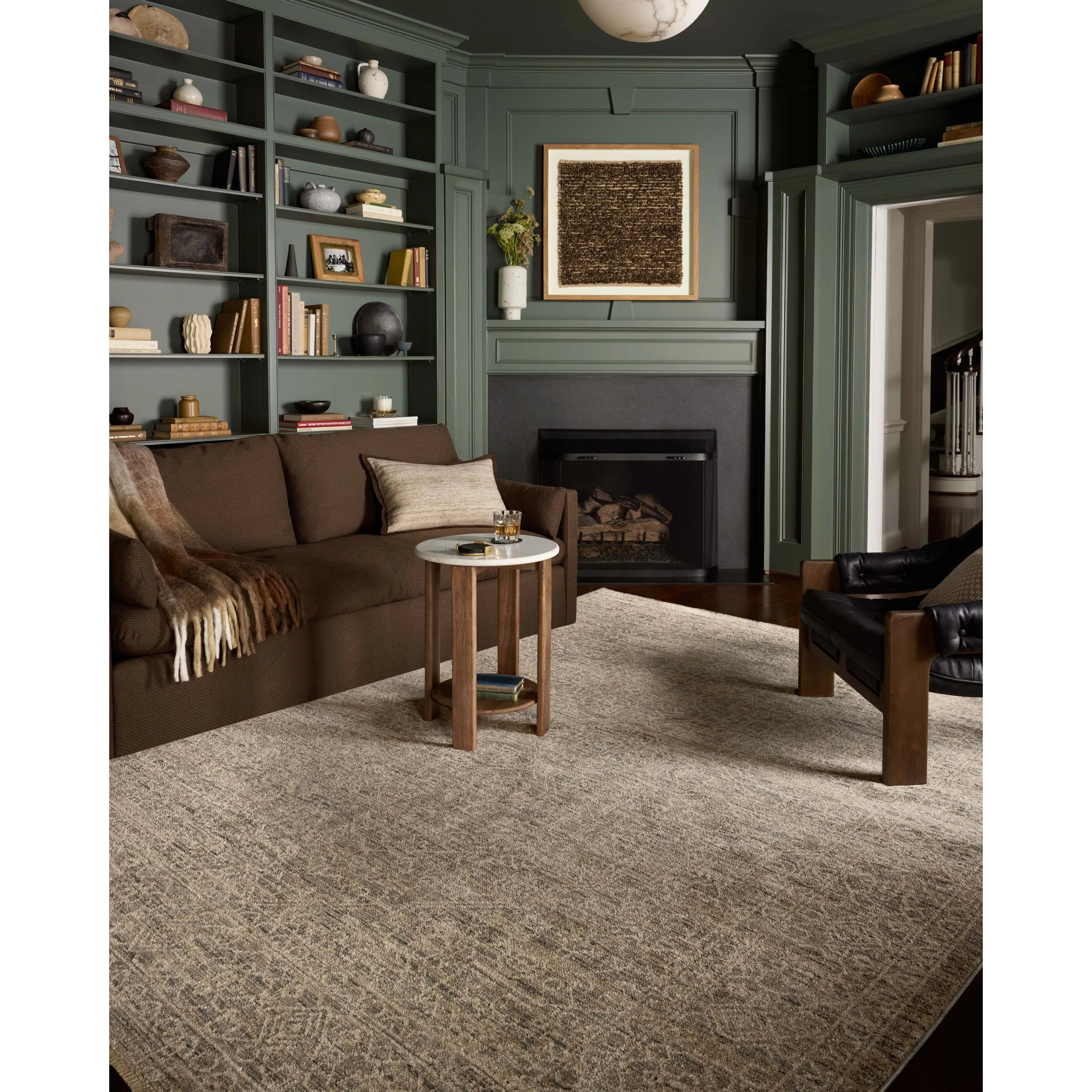 The Newman Collection is a power-loomed area rug made of soft space-dyed polyester, which lends a subtle gradation of color in an easy-to-clean, no-shed construction. The versatile, vintage-inspired design features distressed white motifs against lovely and light tonal backgrounds. Amethyst Home provides interior design, new home construction design consulting, vintage area rugs, and lighting in the Calabasas metro area.