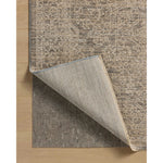 The Newman Collection is a power-loomed area rug made of soft space-dyed polyester, which lends a subtle gradation of color in an easy-to-clean, no-shed construction. The versatile, vintage-inspired design features distressed white motifs against lovely and light tonal backgrounds. Amethyst Home provides interior design, new home construction design consulting, vintage area rugs, and lighting in the Winter Garden metro area.