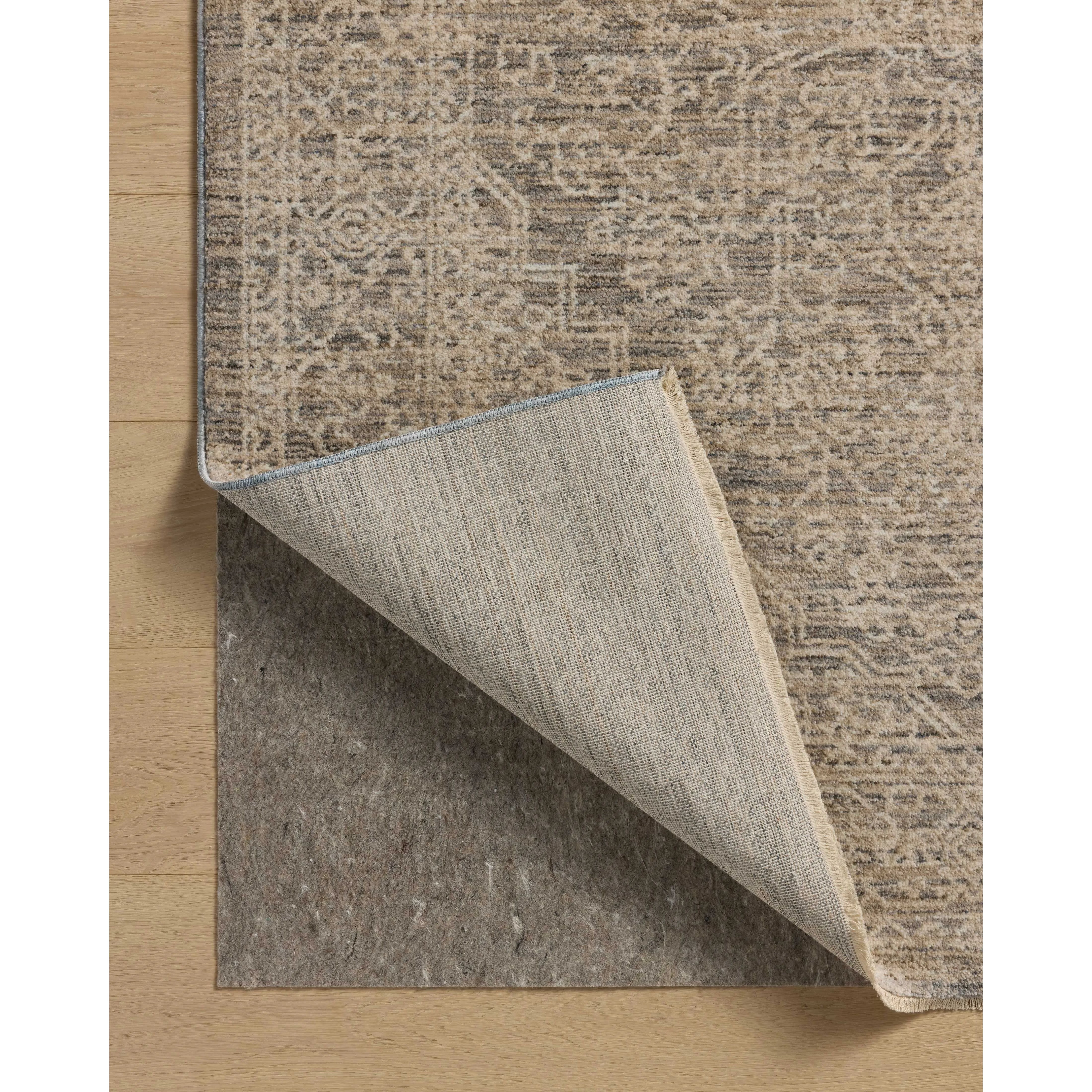 The Newman Collection is a power-loomed area rug made of soft space-dyed polyester, which lends a subtle gradation of color in an easy-to-clean, no-shed construction. The versatile, vintage-inspired design features distressed white motifs against lovely and light tonal backgrounds. Amethyst Home provides interior design, new home construction design consulting, vintage area rugs, and lighting in the Winter Garden metro area.