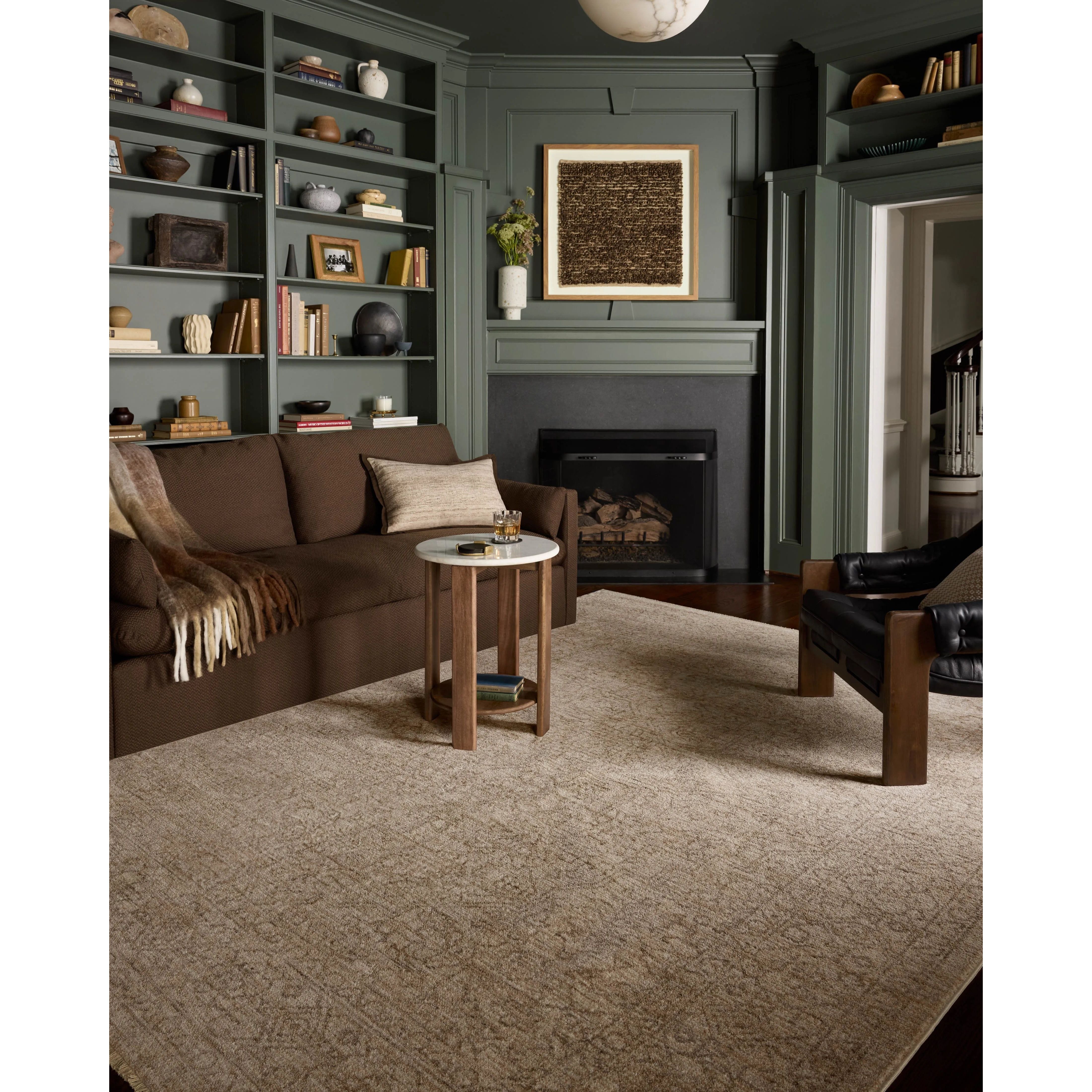 The Newman Collection is a power-loomed area rug made of soft space-dyed polyester, which lends a subtle gradation of color in an easy-to-clean, no-shed construction. The versatile, vintage-inspired design features distressed white motifs against lovely and light tonal backgrounds. Amethyst Home provides interior design, new home construction design consulting, vintage area rugs, and lighting in the Los Angeles metro area.