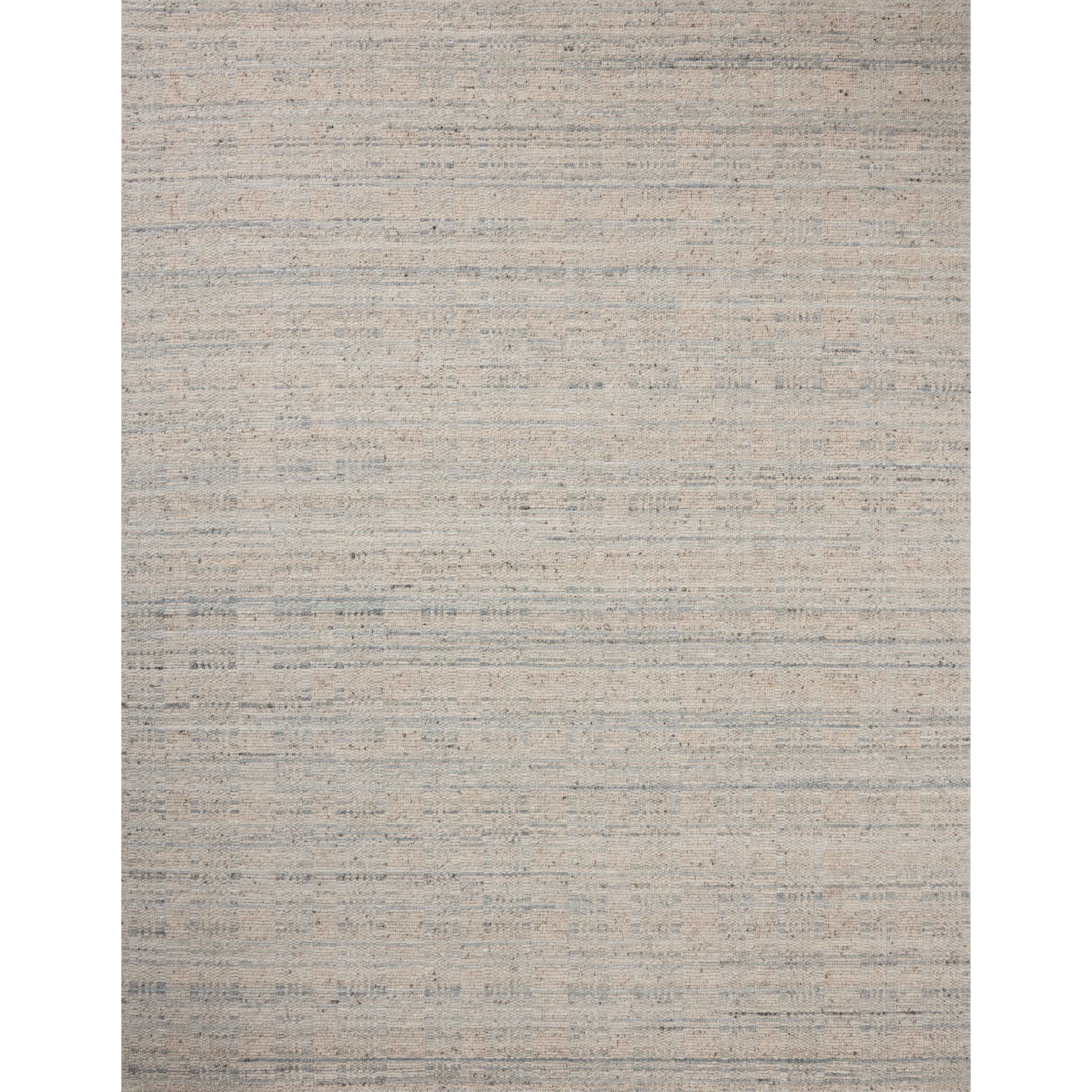 The Sonya Mist / Oatmeal Rug is a hand-loomed area rug with a light, airy palette and understated graphic design. The rug’s textural pile is a soft blend of wool and nylon that creates dimension in living rooms, bedrooms, and more. Amethyst Home provides interior design, new home construction design consulting, vintage area rugs, and lighting in the Monterey metro area.