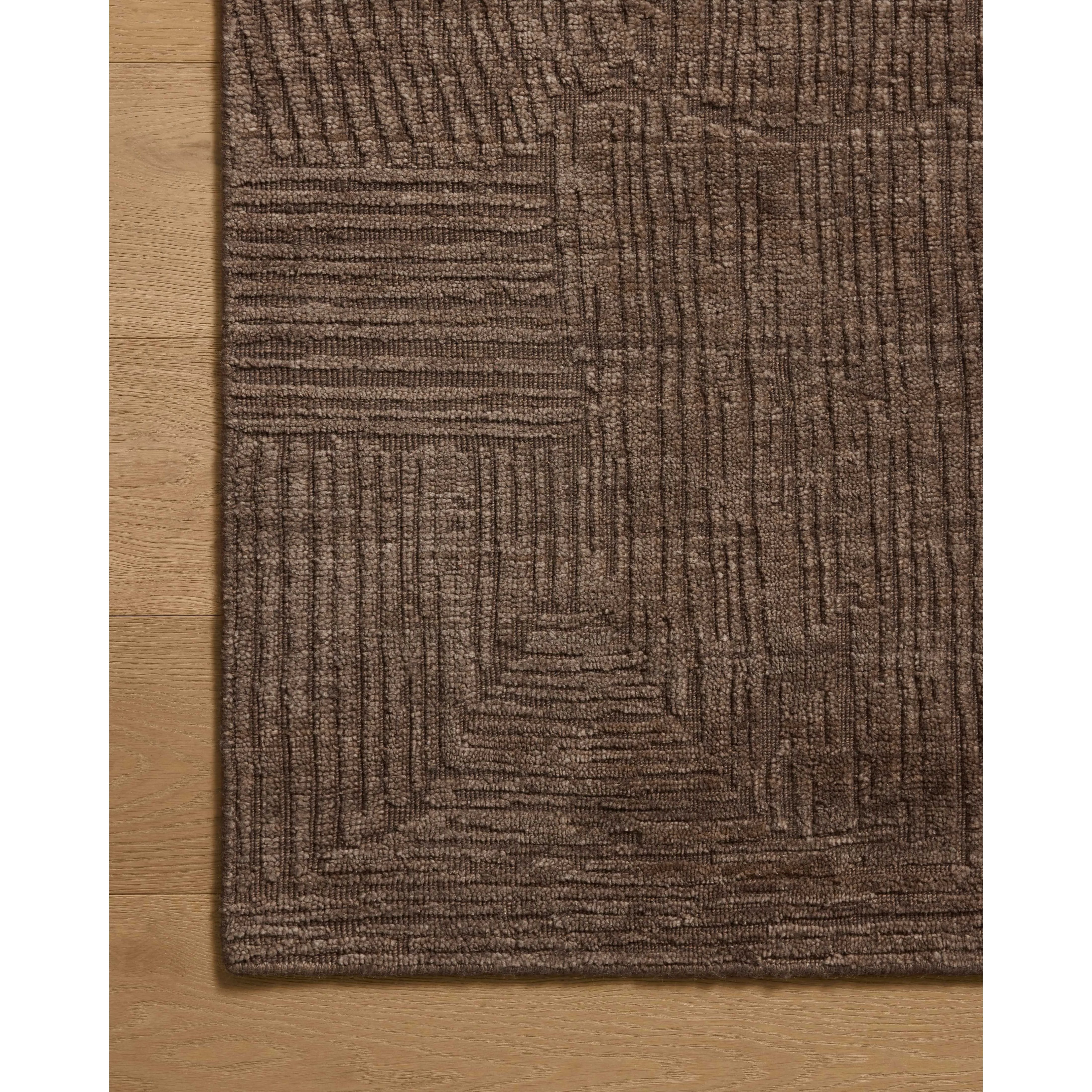 The Woods Collection is a hand-woven area rug with a solid-colored, textured design for elevated home decor. It has a blended wool and rayon pile that is saturated with color and has a subtle sheen, a beautiful rug for living rooms, bedrooms, and more. Amethyst Home provides interior design, new home construction design consulting, vintage area rugs, and lighting in the Omaha metro area.