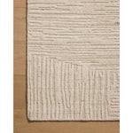 The Woods Collection is a hand-woven area rug with a solid-colored, textured design for elevated home decor. It has a blended wool and rayon pile that is saturated with color and has a subtle sheen, a beautiful rug for living rooms, bedrooms, and more. Amethyst Home provides interior design, new home construction design consulting, vintage area rugs, and lighting in the Houston metro area.