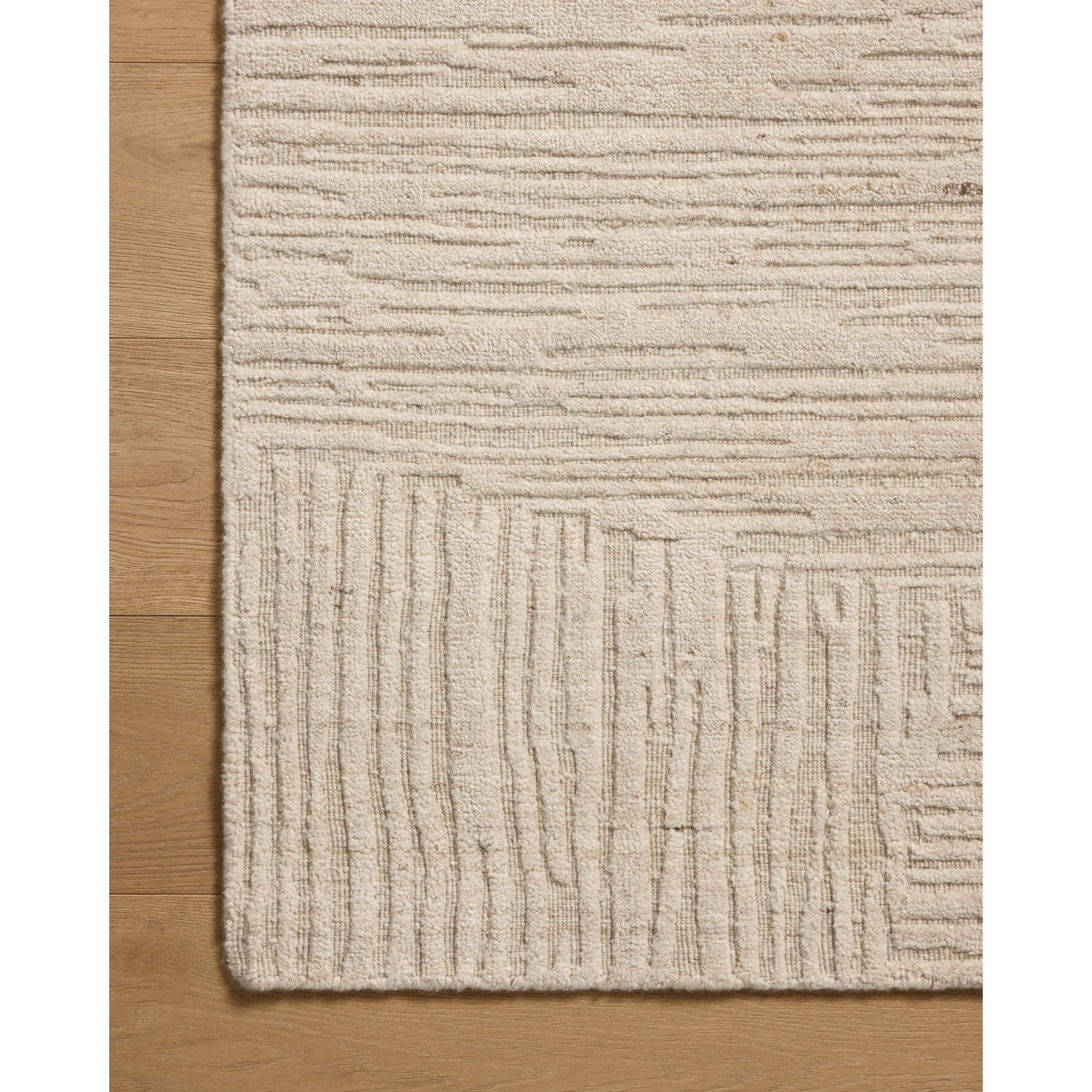 The Woods Collection is a hand-woven area rug with a solid-colored, textured design for elevated home decor. It has a blended wool and rayon pile that is saturated with color and has a subtle sheen, a beautiful rug for living rooms, bedrooms, and more. Amethyst Home provides interior design, new home construction design consulting, vintage area rugs, and lighting in the Houston metro area.