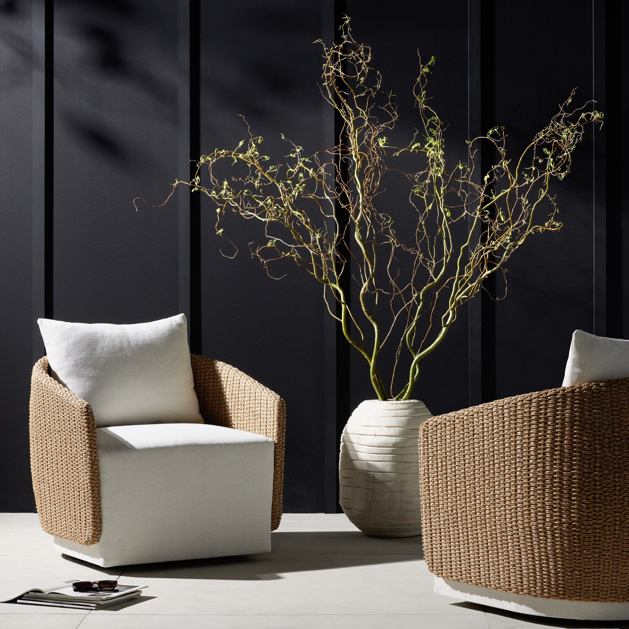 Featuring Maven Alessi Linen Outdoor Swivel Chair by Four Hands at Amethyst Home. Sustainably made with zero waste, luxurious Italian upholstery places a new and unique spin on indoor/outdoor seating, offering soft, durable fabric that's highly resistant to sun, stains, mold and abrasion. Shell framing of faux hyacinth weaves for extra texture atop a 360-degree swivel. Cover or st. Amethyst Home provides interior design, new construction, custom furniture, and area rugs in the San Diego metro area