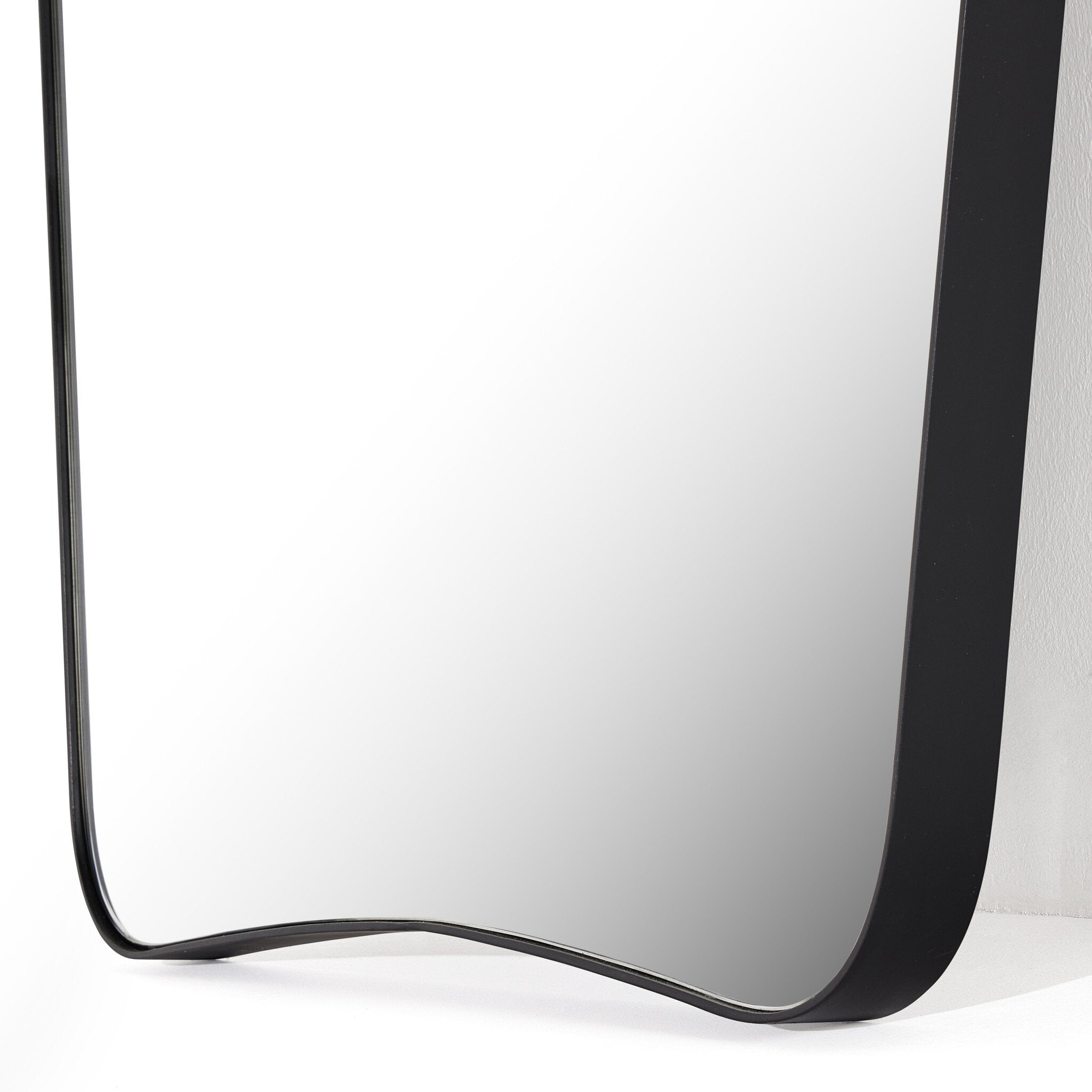 Featuring Merona Iron Matte Black Mantel Mirror by Four Hands at Amethyst Home. A swooped silhouette creates rounded corners while maintaining a sleek overall look.Overall Dimensions: 39.00"w x 2.00"d x 44.00"hWeight : 66.40 lbsMaterials : Iron, Mirror, Engineered Hardwood. Amethyst Home provides interior design, new construction, custom furniture, and area rugs in the Kansas City metro area