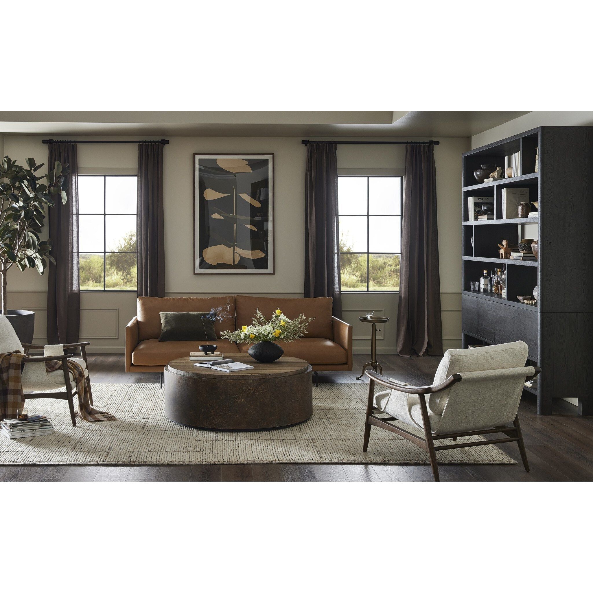 Featuring Noeline Smoked Black Oak Wide Bookcase by Four Hands at Amethyst Home. Made from solid oak and oak veneer and finished in a smoked black, a wide bookcase offers open and concealed shelving, for both storage and display. Push-latch doors make for a clean, seamless look, while subtly rounded corners soften up the whole look.Overall Dimensions: 84.00"w x 18.00"d x 94.00"hWeig. Amethyst Home provides interior design, new construction, custom furniture, and area rugs in the Seattle metro area
